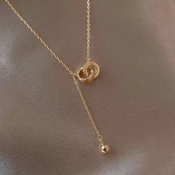 For Love- Interlocked Diamond Tassel Necklace