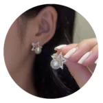 Rotating Star Flower Zircon Earrings